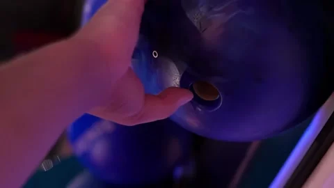 Сlose-up hand taking a bowling ball, vertical Stock Footage 249475335