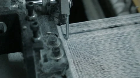 Сlose-up of the process fabric creation on a modern weaving loom in a factory 스톡 동영상 88782266