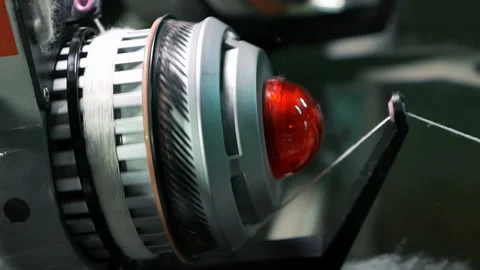 Сlose-up of the spool process fabric creation on a modern weaving loom 스톡 동영상 88785162