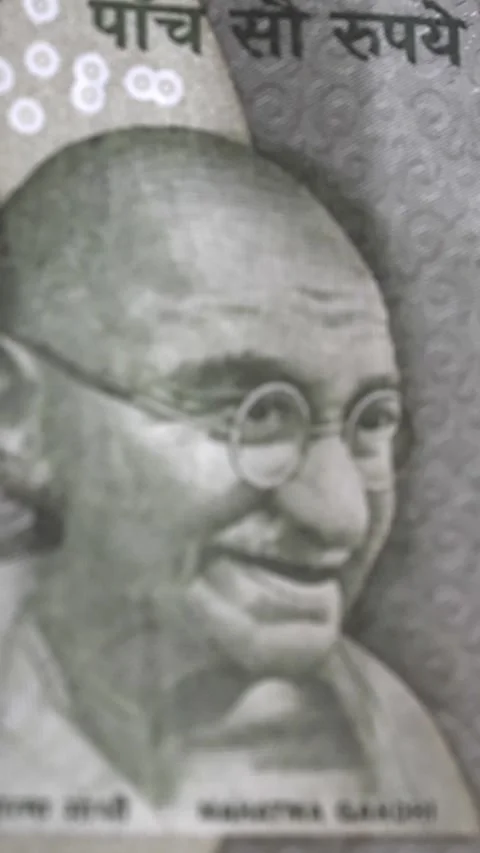 Сlose-up view of Indian 500 rupee banknote with portrait of Mahatma Gandhi Stock Footage 305850995