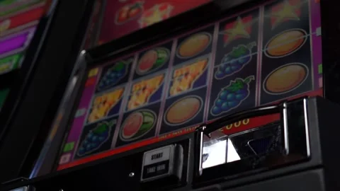 Slot machine displays win in the fruit game, with the "Take Win" button blinking Stock Footage 256790572