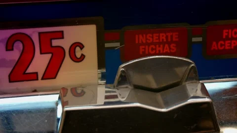 Slot Machine insert Coin 25 Cents Video stock 141343714