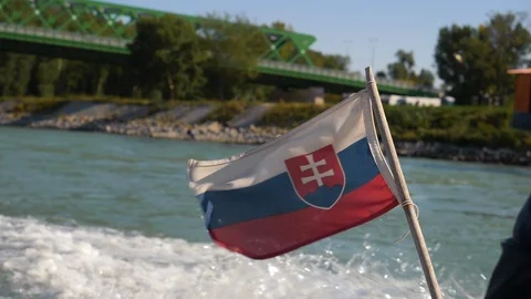 Slovak Flag waving in wind behind girl on a boat Stock Footage 120537741