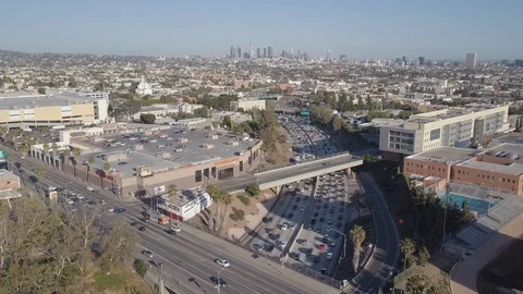 Slow Aerial Drone of Congested Traffic on Interstate Los Angeles California Stock Footage 103500159