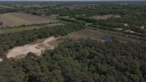 Slow Aerial Drone Push Over Forest Clearing with Railway in Background Stock Footage 310439768