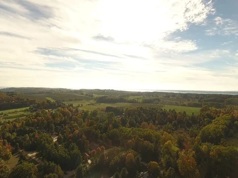 Slow Aerial lower over landscape Stock Footage 76018448