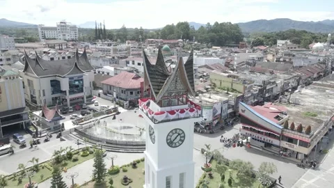 Slow Aerial Orbit Around Jam Gadang Clock Tower in Bukittinggi, West Sumatra Stock Footage 343198854