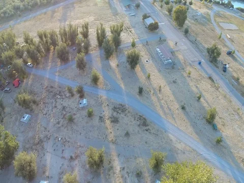 Slow Aerial Pan Over Desert Campground Stock Footage 80284977