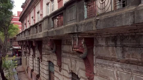 Slow aerial pull out revealing the abandoned Savoy Hotel that has Stock Footage 249794382