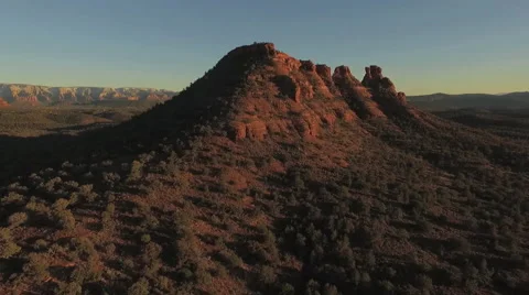 Slow Aerial Rise above Sedona's Cockscomb red rocks Stock Footage 59100598