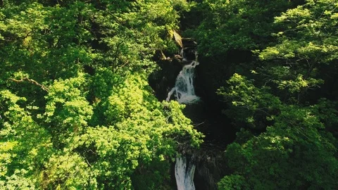 Slow Aerial shot flying backwards - National Park Wales Stock Footage 90540705