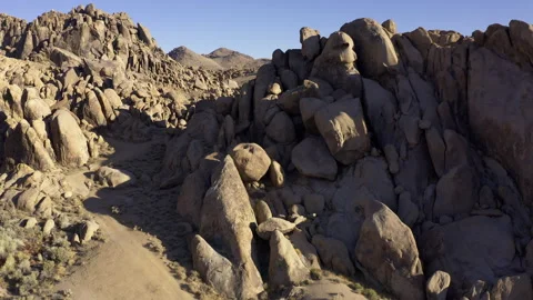 A slow and low flight toward a rock formation. Stock Footage 155652756