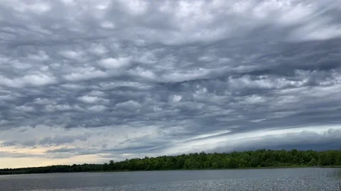 Slow approach of timelapse clouds 50 shades of gray rain coming Stock Footage 185749662