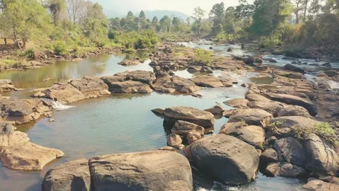 Slow backward drone shot of Tad Lo waterfall in Boloven Plateau, Laos 스톡 동영상 247865740
