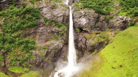 Slow backwards drone clip of waterfall in Norway Stock Footage 158151335