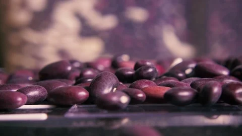 Slow beans falls on a pile close-up Stock Footage 94381094