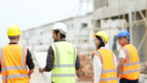 Slow Blur . Four Civil engineer walking Stock Footage 196968612
