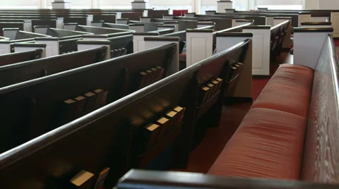 Slow camera move (dolly) shot along church pews Stock Footage 35400777