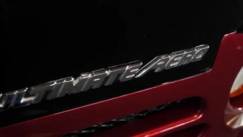 Slow camera move left showing text on car ULTIMATE AERO Vídeo Stock 274320087