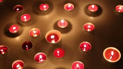 Slow camera move over moody red candles  動画素材 42253938