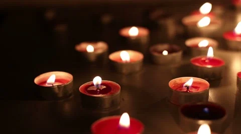 Slow camera move over moody red candles  Stock Footage 42493039