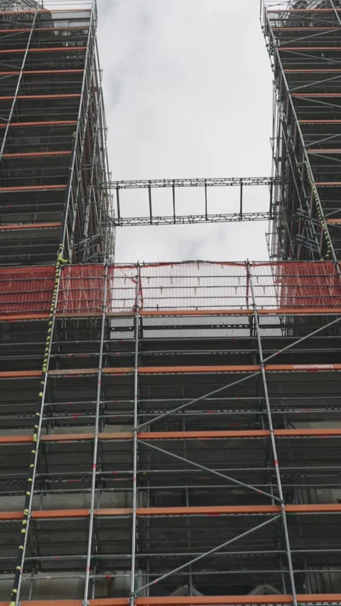 Slow camera movement reveals a massive construction site with extensive 스톡 동영상 332710329