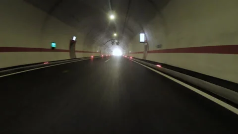 A slow car drive to the light at the end of the tunnel Stock Footage 204040804