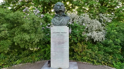Slow cinematic orbit around Alexander Pushkin monument Видео 335399059