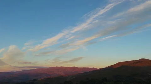 Slow Cinematic Pan of Wispy Sunset Clouds Over Peneda-Gerês. Stock Footage 346352419