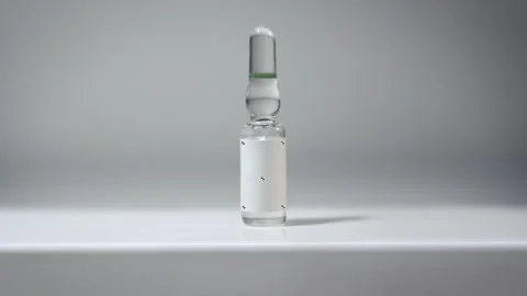 Slow Cinematic Push-In on Injectable Glass Ampoule with VFX Tracking Markers Stock Footage 331751752