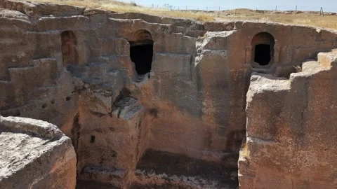Slow Cinematic Push Toward Upper Cave Opening in Dara Ancient City Stock Footage 334793566