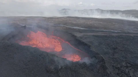 Slow circle around Litli Hrutur erupting crater, Iceland 4K Stock Footage 247930341
