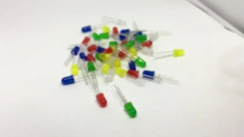 Slow Close Up over stack of LEDs. Light-emitting diode (LED) in blue, Stock Footage 131498928
