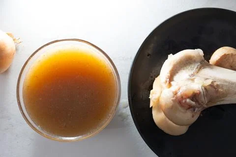 Slow-Cooked Bone Broth as a Collagen-Rich Superfood for Daily Nourishment Stock Photos
