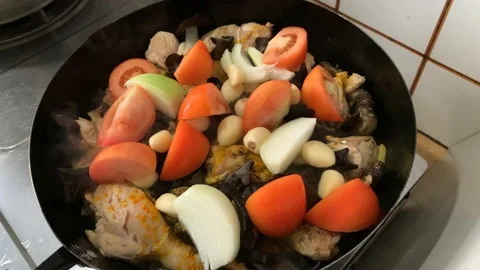 Slow Cooking Chicken on Pan Stock Footage 132093147