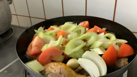 Slow Cooking Chicken on Pan Stock Footage 132093211