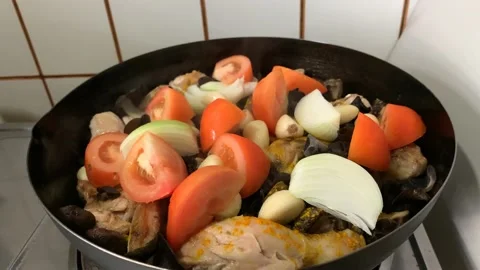 Slow Cooking Chicken on Pan Stock Footage 132093347