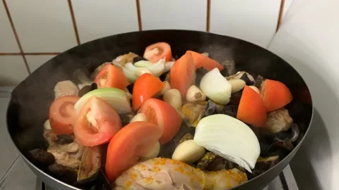 Slow Cooking Chicken on Pan Stock Footage 132093348