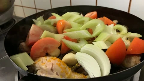 Slow Cooking Chicken on Pan Stock Footage 132093397