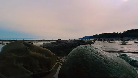 Slow Crawling Shot Over Large Rocks On Ocean Floor At Low Tide Stock Footage 255335736