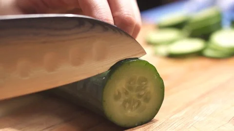 Slow Cucumber Slice Stock Footage 127129135