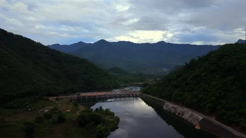 Slow Descending Drone Shot Over Mountain Dam Reservoir Stock Footage 336857231