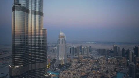 Slow descent down Burj Khalifa from 425m to 350m sunset/evening, dusk. Stock Footage 99031353