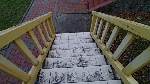 A slow descent down the wide steps Stock-Footage 321615253