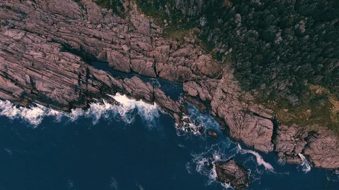 Slow Descent onto Rocky Coastline Stock Footage 101981650
