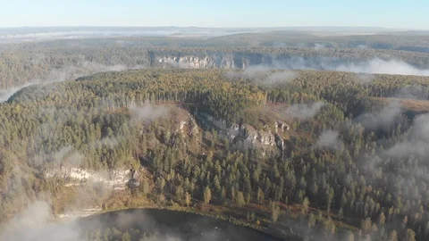 Slow direct flight over a gentle mountain river, pine forest, clouds. Ay river. Stock Footage 101627254