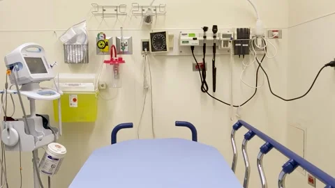 Slow dolly left of an empty medical assessment room ready for a patient. Stock Footage 146183283