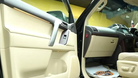 Slow Dolly Towards Open Passenger Side Door To Interior Of Toyota Land Stock Footage 195465636