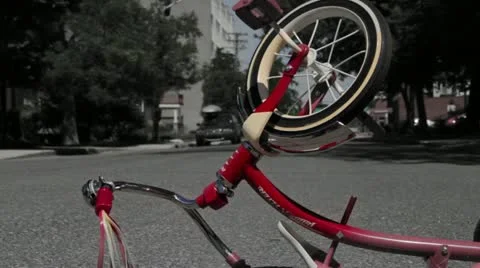 Slow Dolly Upside Down Tricycle - Child Tragedy Stock Footage