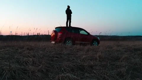Slow Down To Enjoy Your Trip, Traveler young man launches a quadrocopter Stock Footage 136057490